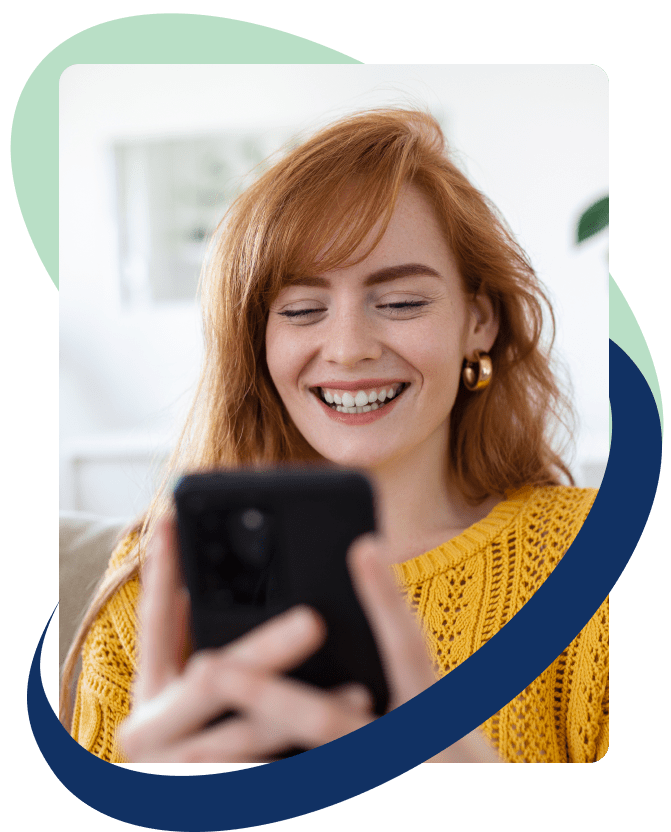 woman holding phone smiling